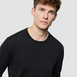 Nahtloser Core-Strickpullover mit Rundhalsausschnitt in Schwarz